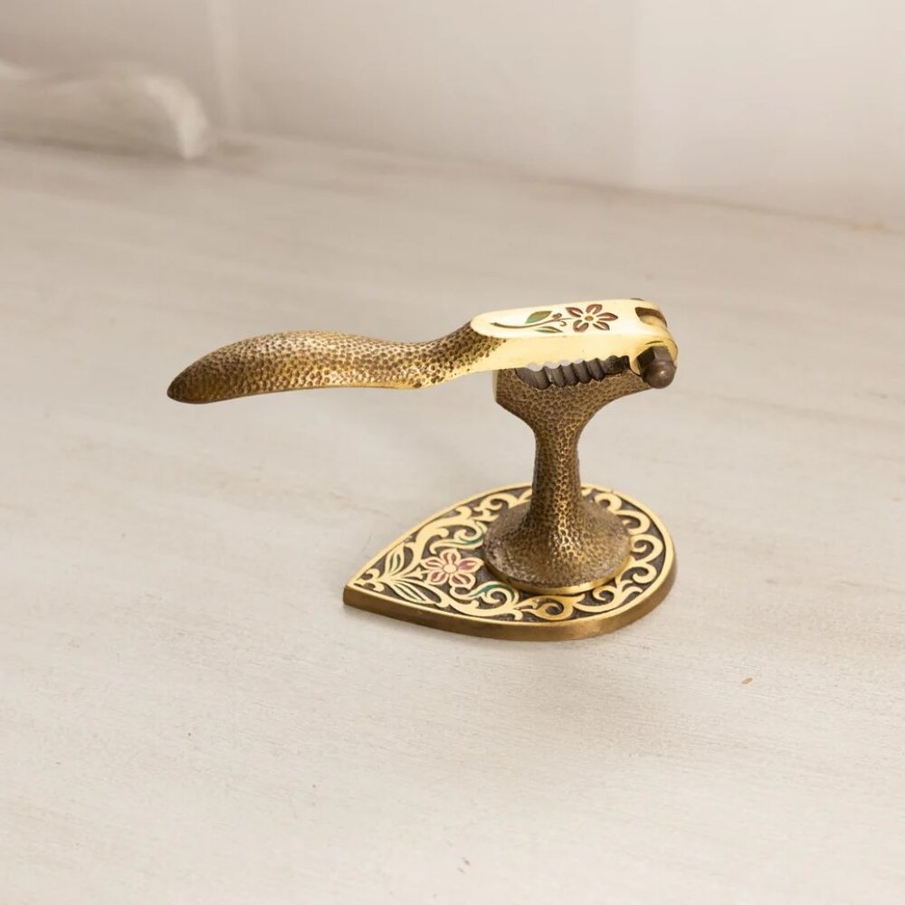 Brass Footed Nutcracker with Floral Designs